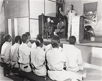 (NEW DEAL PROGRAMS: CCC BOYS) A group of 10 photographs depicting the Civilian Conservation Corps.